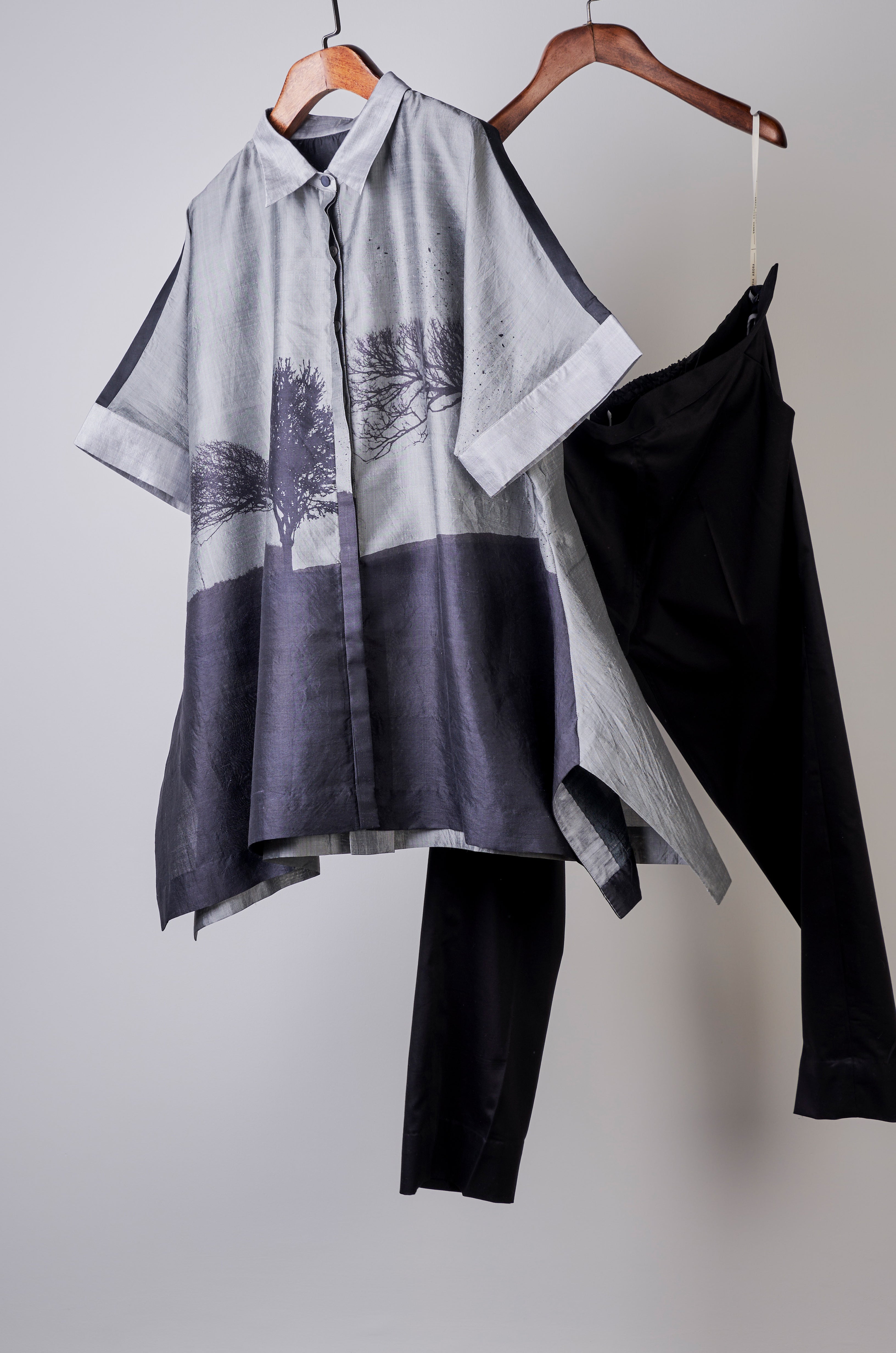 Black and grey printed top with solid pants Coordinated set