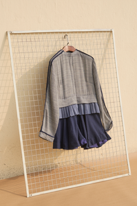 Short grey jacket with pleats